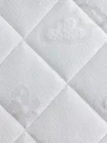 Sebra Матрас в детскую кроватку Nighty с закруглёнными углами и вентиляционными вставками, 87х41х6 см, белый — фото 3