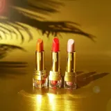 Бальзам для губ Pure White Cosmetics SunKissed Tinted Lip Shimmer Balm SPF20, оттенок LP02 - CORAL SпарKLER — фото 3