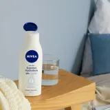 NIVEA мгновенно увлажняющий бальзам для тела для сухой кожи, 400 мл — фото 3