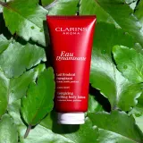 Clarins Eau Dynamisante Melting Body Lotion - Энергетическое молочко для тела, 200 мл — фото 4