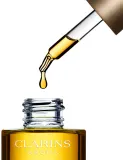 Clarins Lotus Treatment Oil - Крем для лица с гладким действием на день и ночь, 30 мл — фото 3