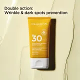 Clarins Youth-Protecting Sunscreen High Protection - Крем для загара лица SPF 30, 50 мл — фото 2