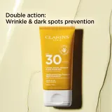 Clarins Youth-Protecting Sunscreen High Protection - Крем для загара лица SPF 30, 50 мл — фото 4