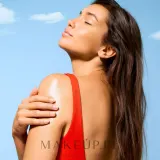 Бронзирующее масло для загара Nuxe Sun SPF 50 для лица и тела — фото 6