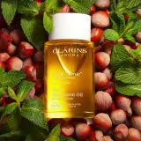 Clarins Tonic Body Treatment Oil тонизирующее масло для тела 100 мл — фото 1