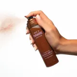 Isle Of Paradise Sunny Serum Setting Spray спрей-фиксатор макияжа с эффектом сияния, 100 мл, оттенок Golden Hour — фото 1